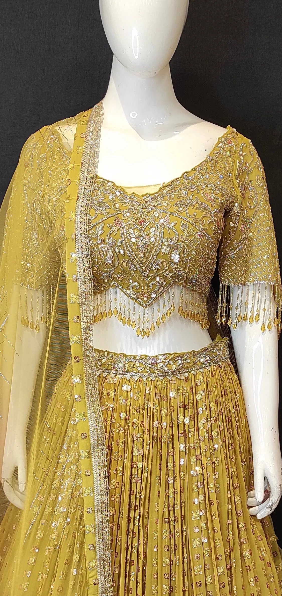 Georgette Lehenga Choli with Sequins,Swarovski,Stone,Cutdana and Zarkan Work