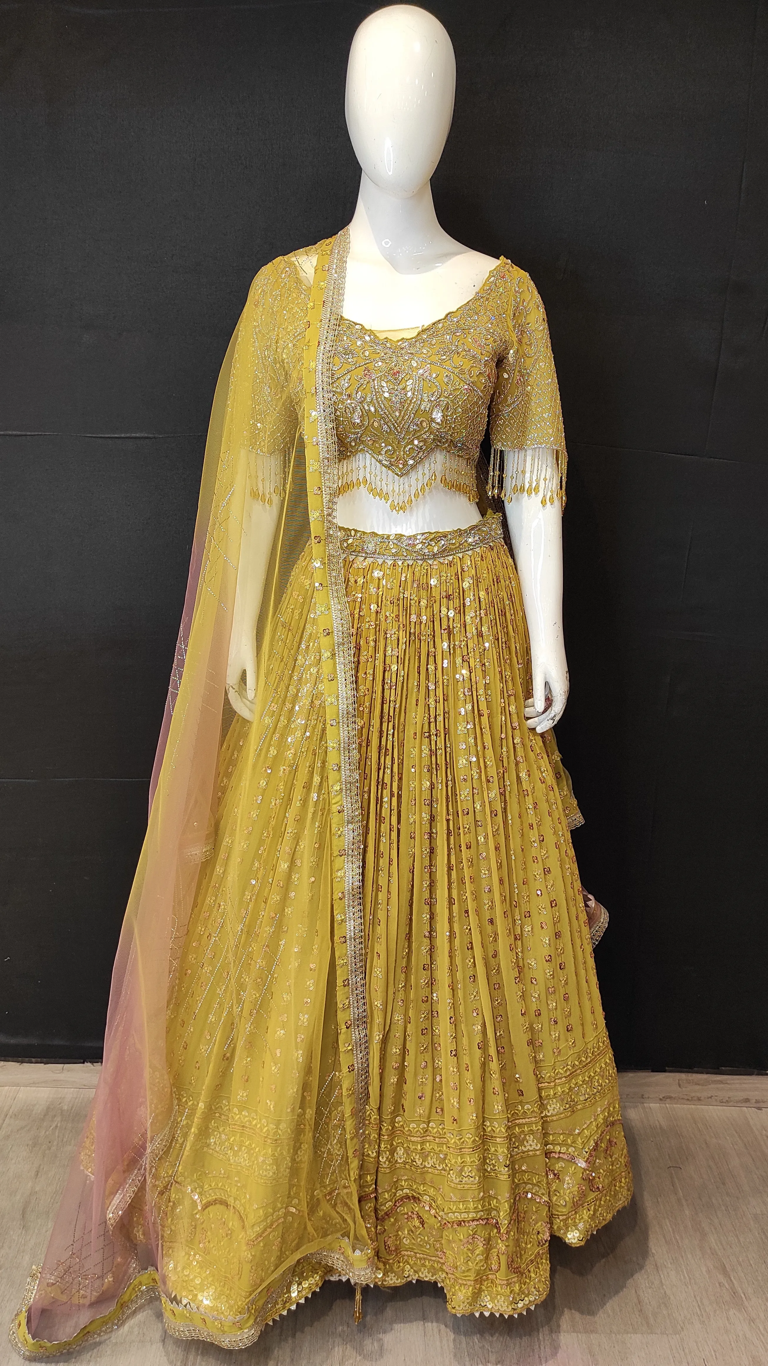 Georgette Lehenga Choli with Sequins,Swarovski,Stone,Cutdana and Zarkan Work