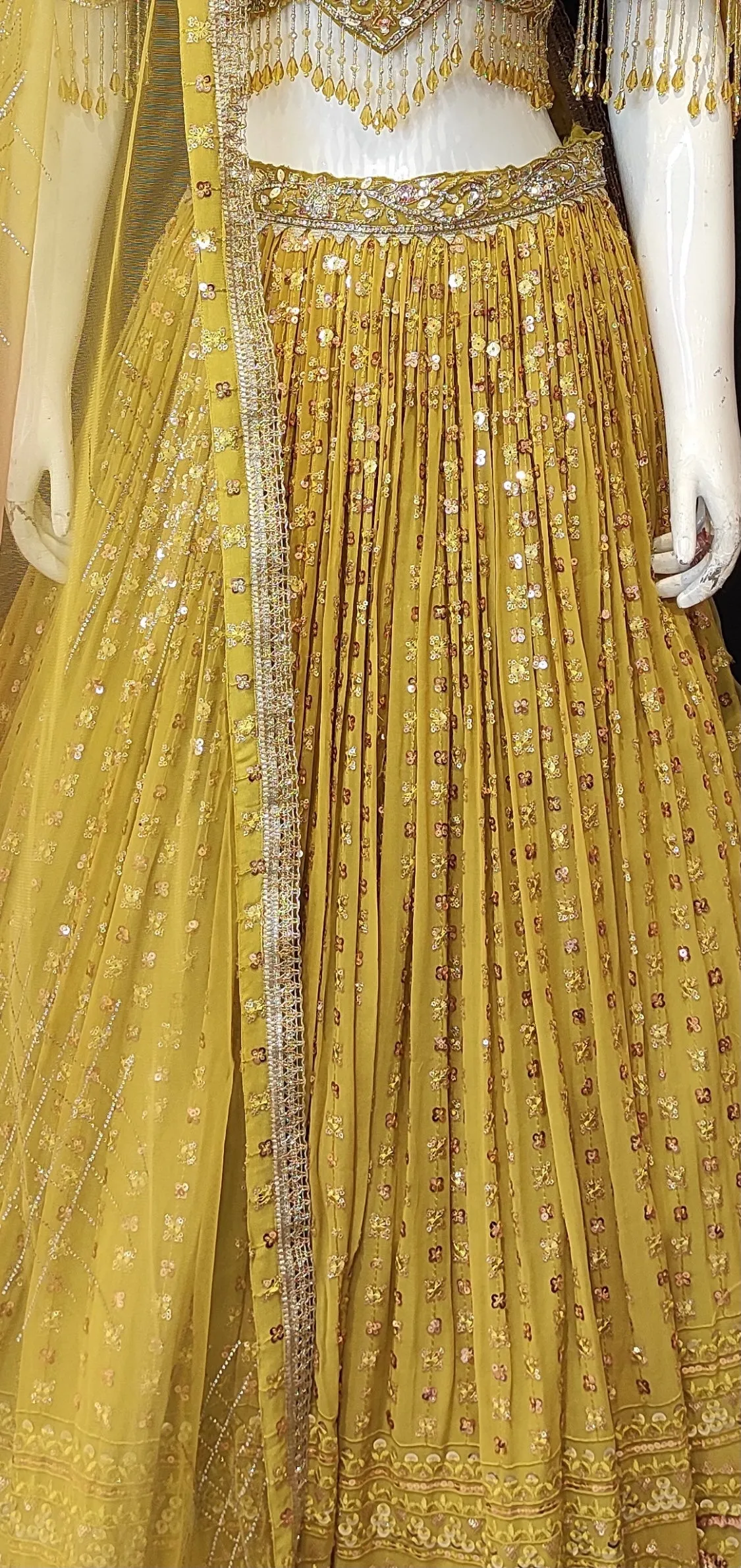 Georgette Lehenga Choli with Sequins,Swarovski,Stone,Cutdana and Zarkan Work