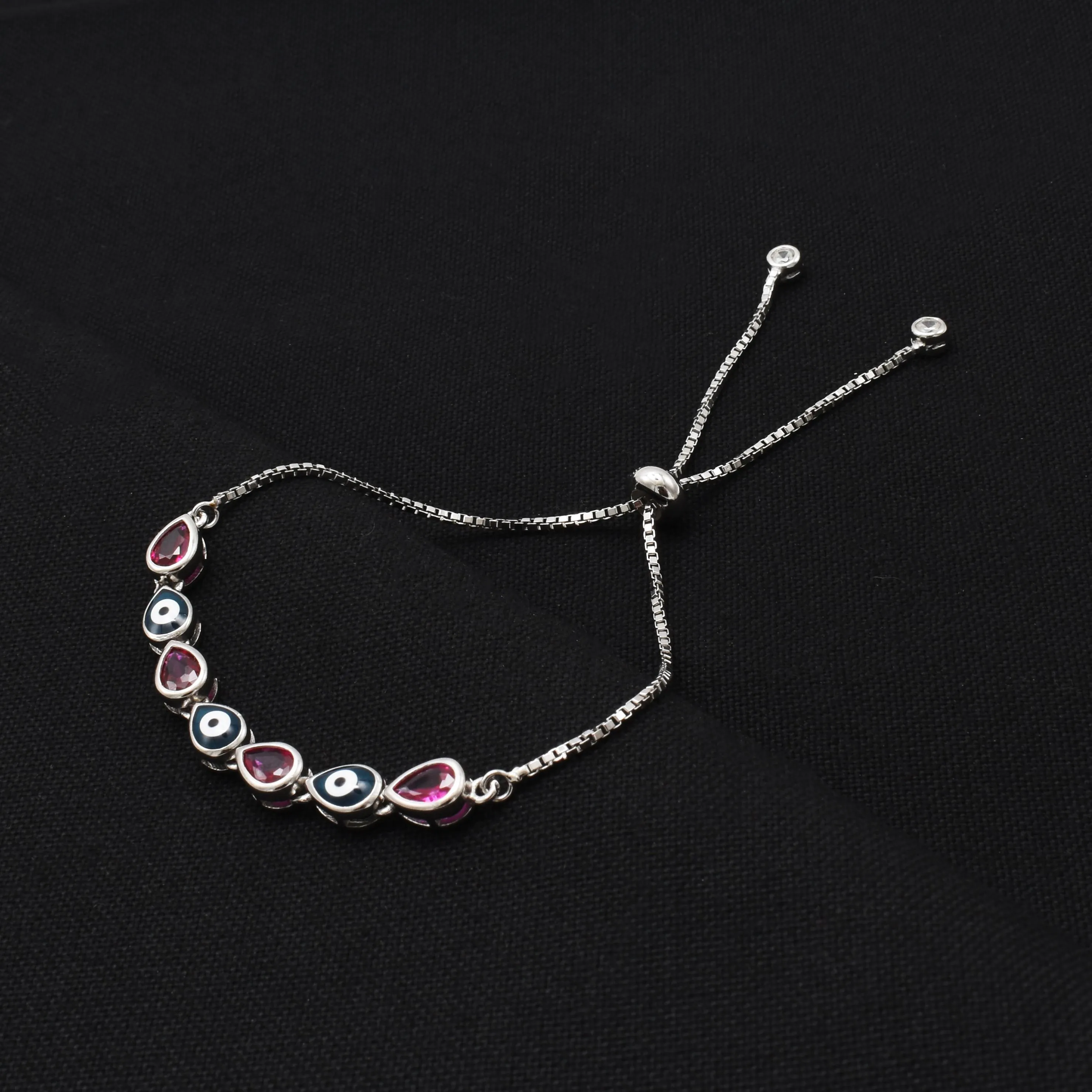 Silver Alternative Pink And Evil Gems Bracelet